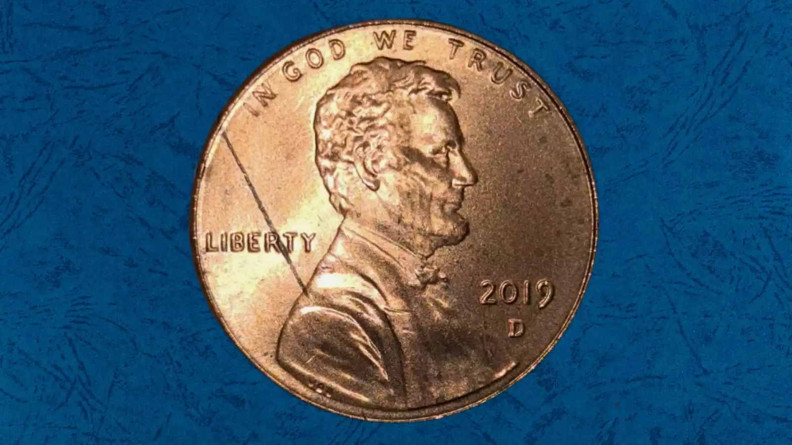 2019 Lincoln penny reverse showing strike-through error on BU letters in E PLURIBUS with weakened or missing letter detail