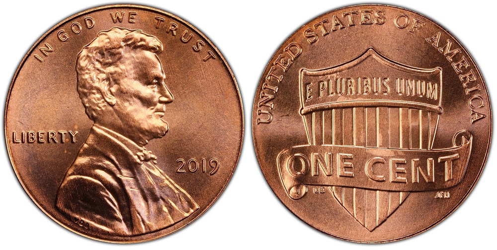 Grading strip of four 2019 Lincoln pennies showing worn, circulated, uncirculated, and gem condition side by side